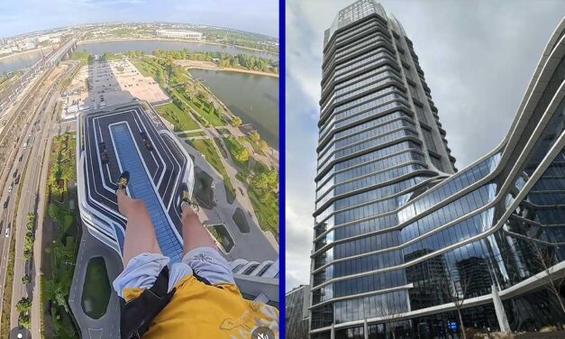 Kijátszotta a biztonságiakat: Elképesztő videón, ahogy egy bázisugró férfi váratlanul leugrik Budapesten a Mol-torony tetejéről